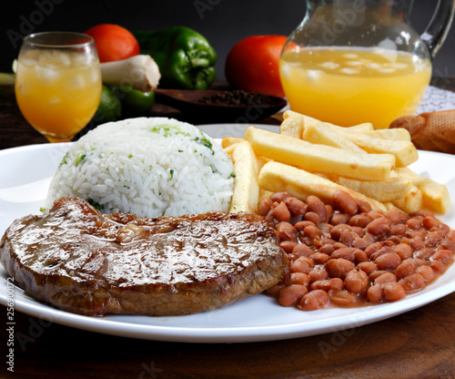 Rice with beans and meat photo