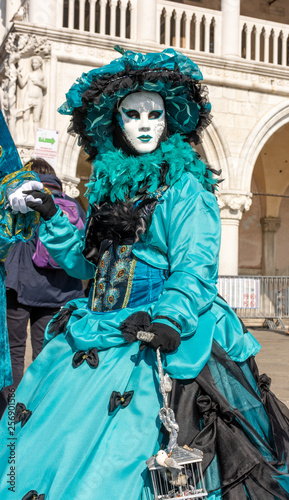 Italy, Venice, carnival, 2019, masked people roam the city, posing for photographers and tourists, with beautiful clothes. © benny