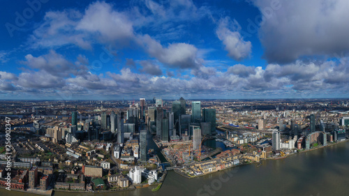 Aerial bird's eye panoramic photo taken by drone of iconic Canary Wharf skyscraper complex and business district, Isle of Dogs, London, United Kingdom