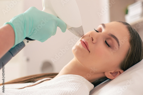 Close up of laser hair removal on the face