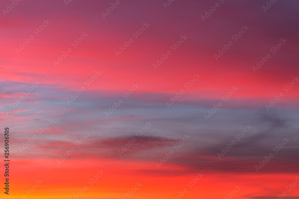 burning sky at sunset. Red sky abstract background. pink cloudy sky. Colorful sunset background 