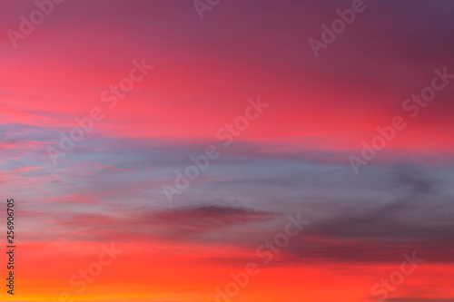 burning sky at sunset. Red sky abstract background. pink cloudy sky. Colorful sunset background  © ihorhvozdetskiy