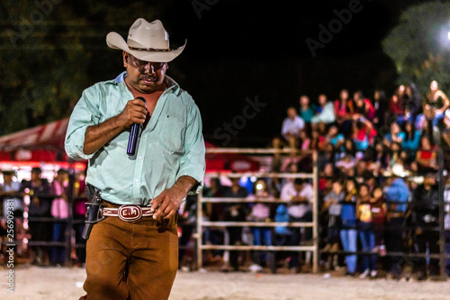 latin man talking politics in Guatemalan village © kyle