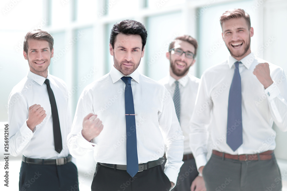 confident business team standing in the office. confident business team standing in the office.