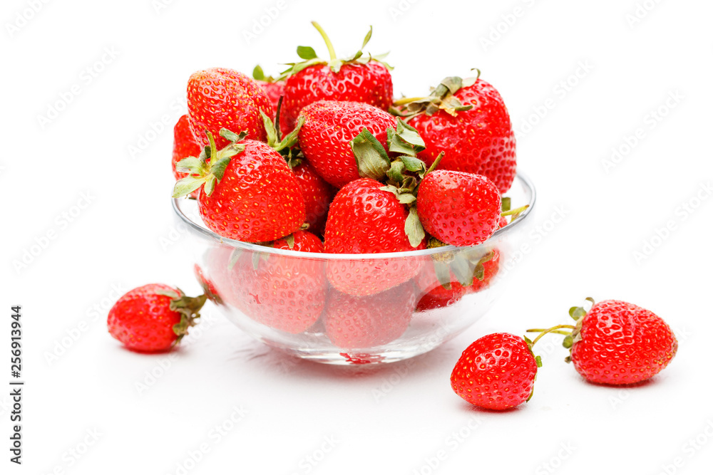 Image of green strawberry in glass cup on empty white background. Image of green strawberry in glass cup on empty white background.