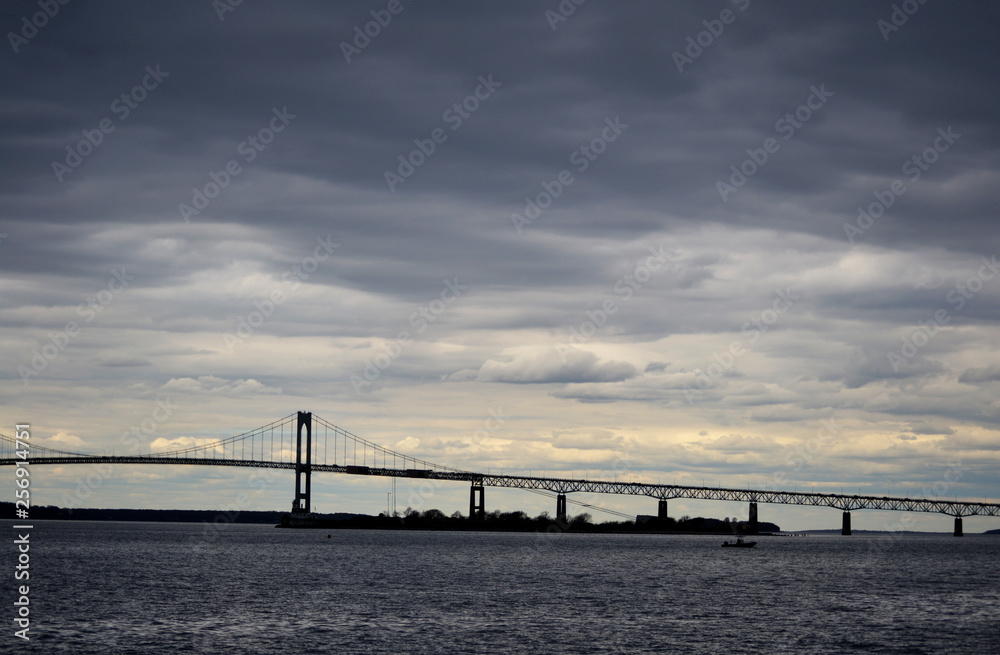 Stormy Skies Over a Long Bridge