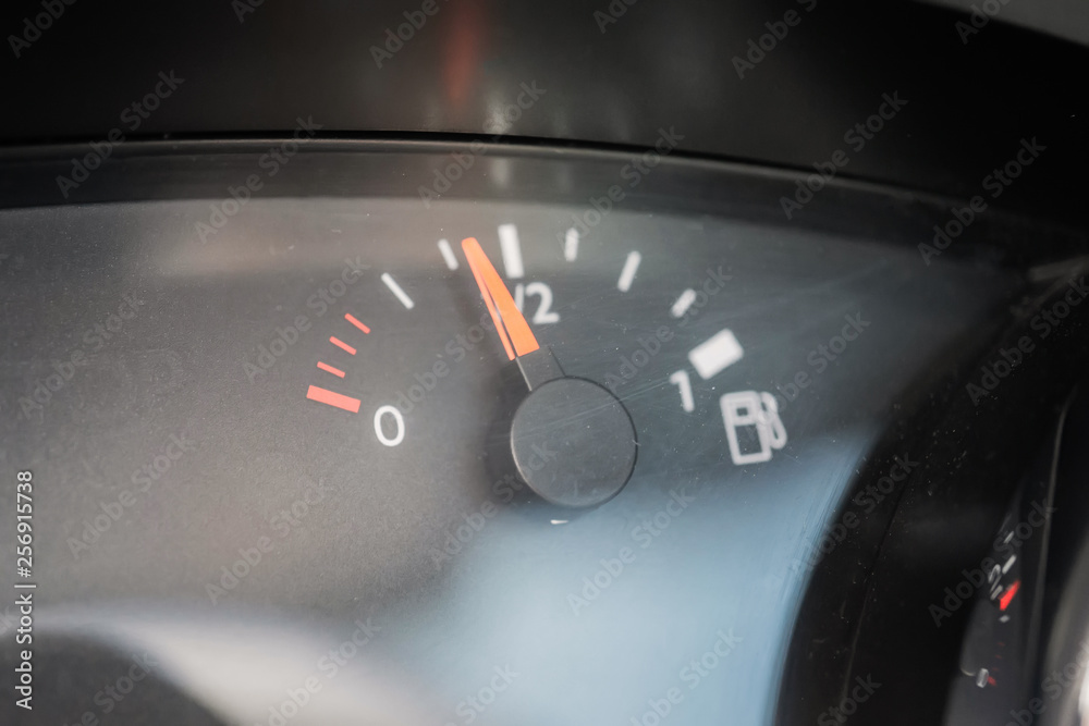 Naklejka premium Fuel indicator. Interior of a modern car