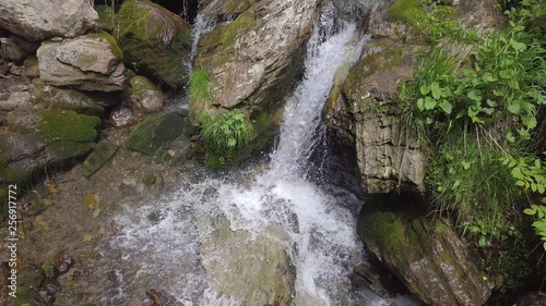 Moving down with water to stone  shot from drone