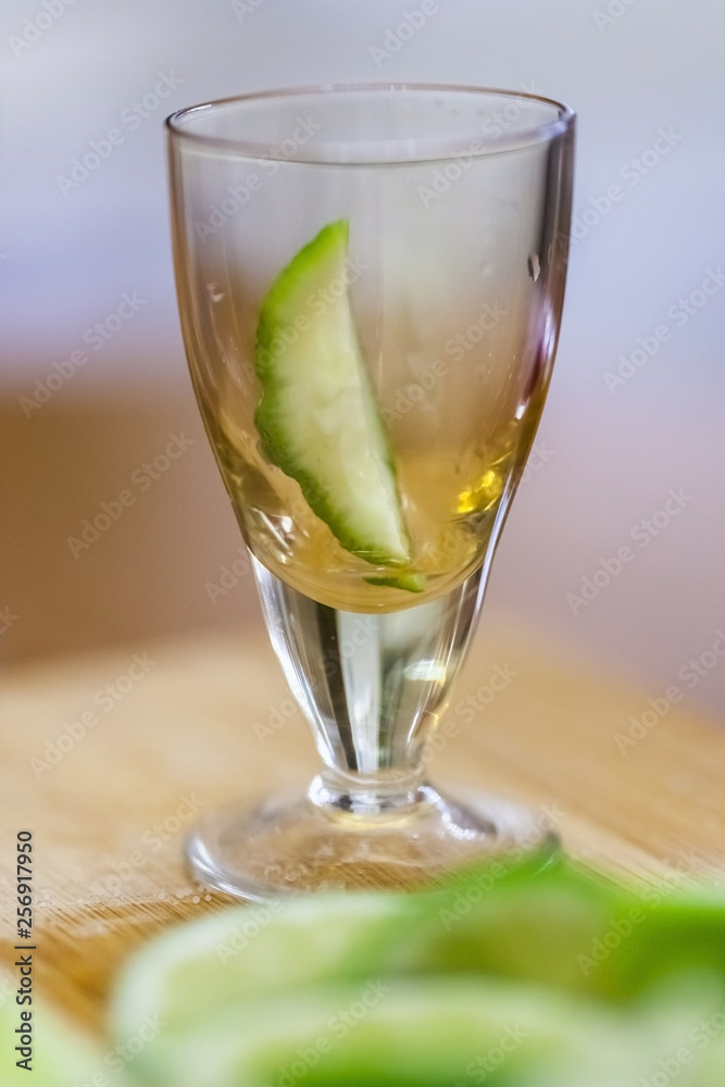 stack with lime slice on wooden table, close up, blurry background stack with lime slice on wooden table, close up, blurry background