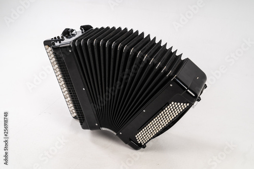 Black accordion on pure white background