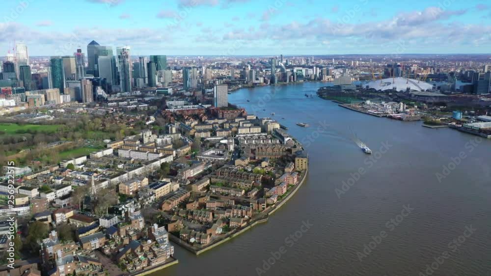 Aerial bird's eye panoramic video taken by drone of iconic Canary Wharf skyscraper complex and business district with beautiful clouds, Isle of Dogs, London, United Kingdom Aerial bird's eye panoramic video taken by drone of iconic Canary Wharf skyscraper complex and business district with beautiful clouds, Isle of Dogs, London, United Kingdom