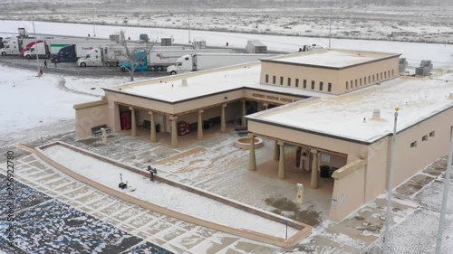 Aerial drone footage Glenrio Visitor Center New Mexico winter snow 4k photo