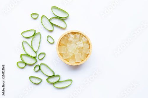 Aloe vera slices and gel on white background.
