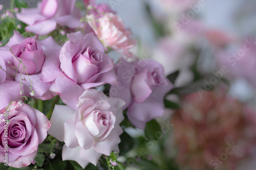 Bouquet of lilac roses and other flowers