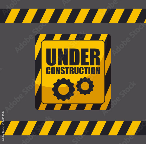 under construction label with traffic signals