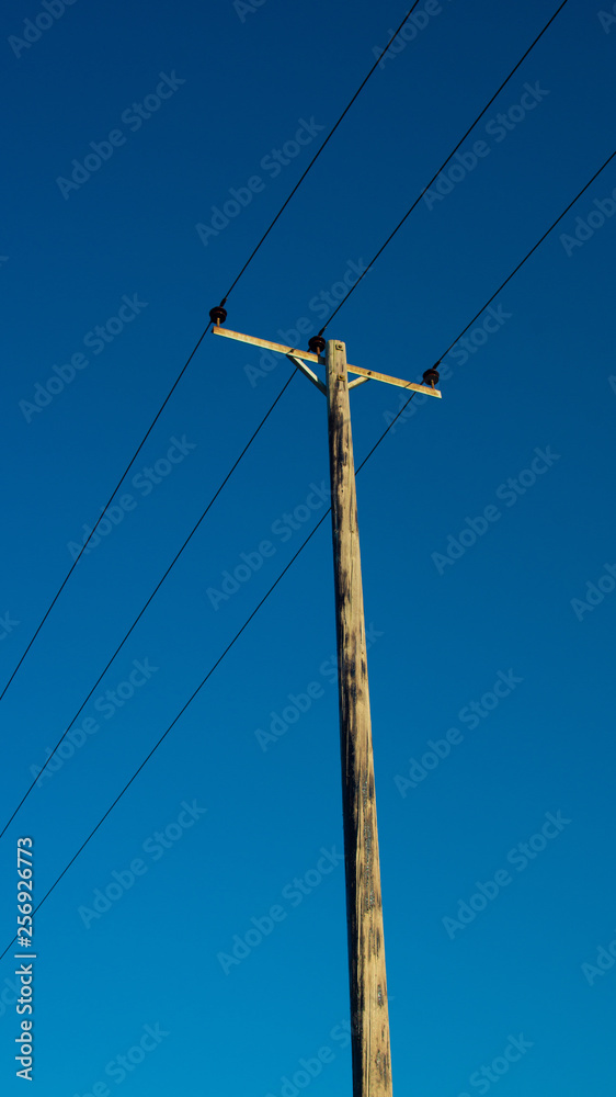 power lines against blue sky