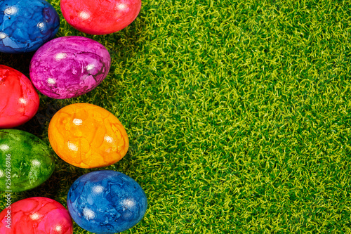 Easter eggs as decorative background for greeting cards and place for your own text photo