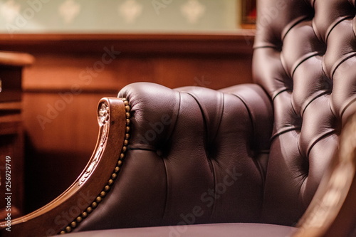 Soft leather Armchair in a luxurious interior photo