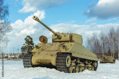 Old Tank on the snow, participated in the 2nd world war. photo