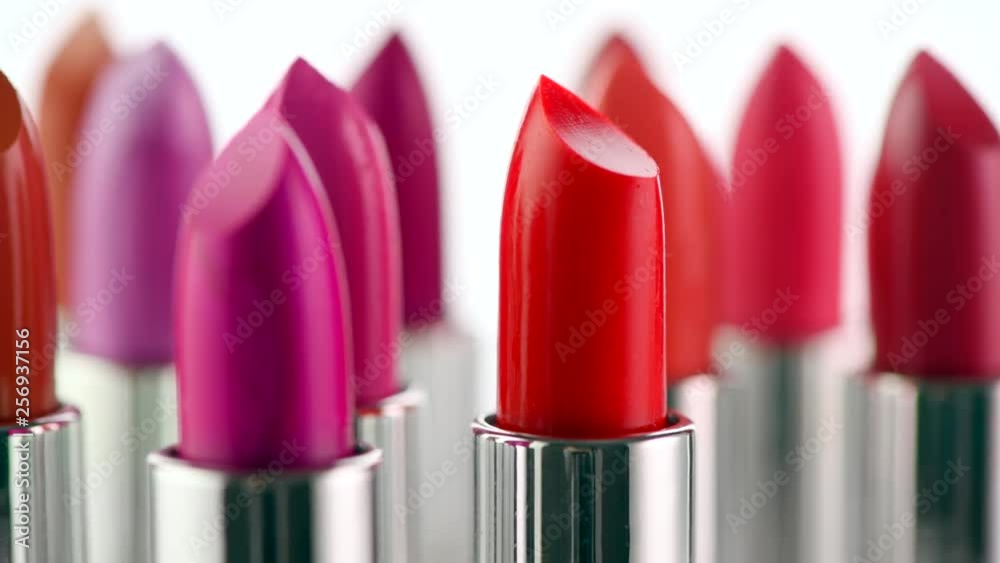 Lipstick tints palette. Fashion colorful lipsticks rotated over white background. Professional makeup and beauty. Lipgloss closeup. 4K UHD video footage. 3840X2160 Lipstick tints palette. Fashion colorful lipsticks rotated over white background. Professional makeup and beauty. Lipgloss closeup. 4K UHD video footage. 3840X2160