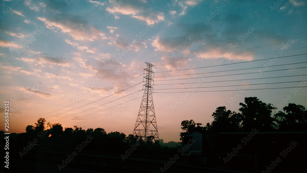 Sunrise with electrical tower