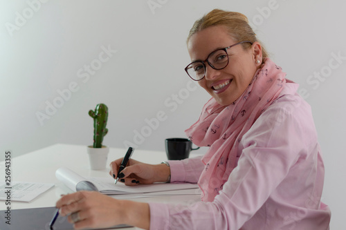 Woman working in the oficce photo