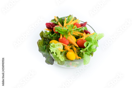 Mix of vegetable salad in glass bowl