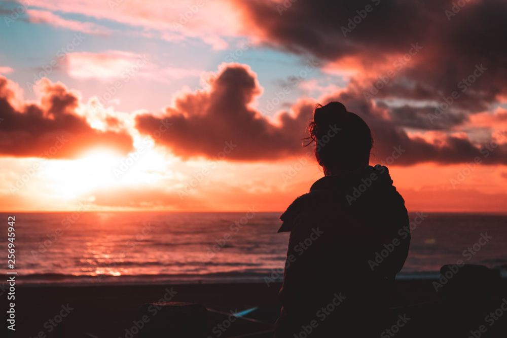 Girl watching sunset
