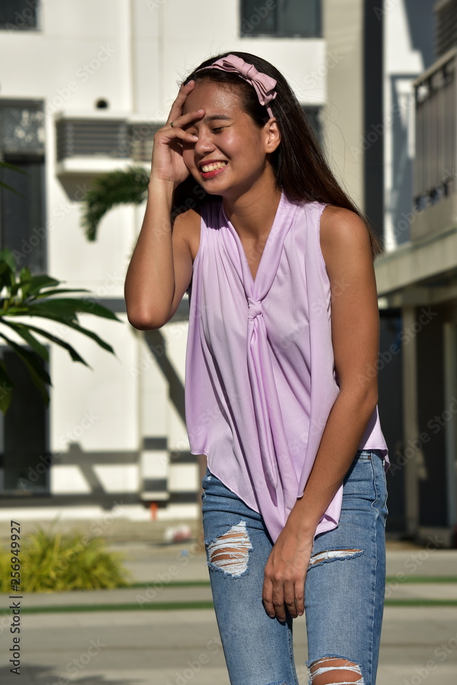 Fototapeta premium Youthful Filipina Female Laughing