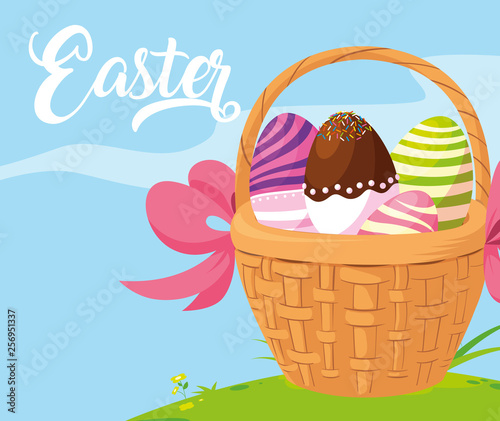 decorated easter eggs with basket wicker in grass