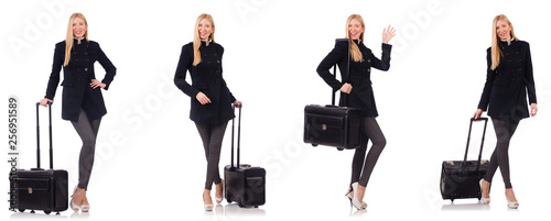 Beautiful woman in black coat with suitcase
