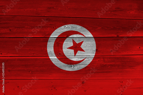 Tunisia flag painted on old wood plank