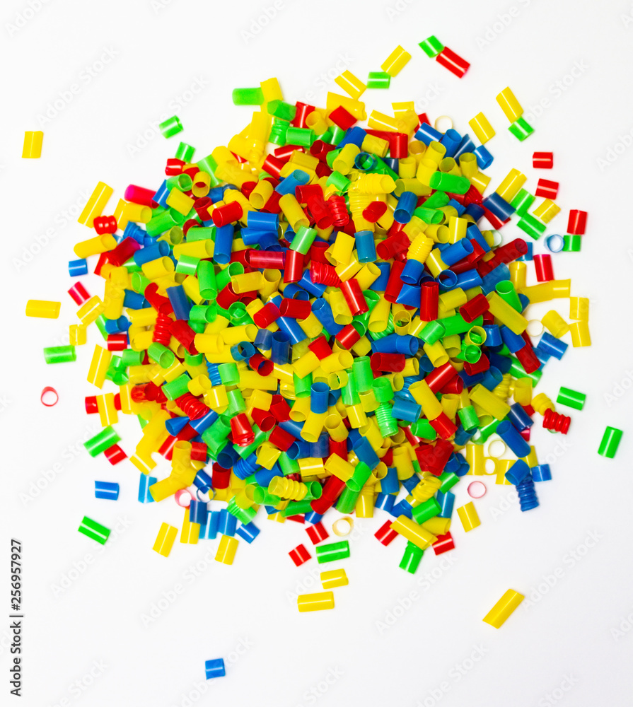 Multicolored plastic pieces Multicolored plastic pieces