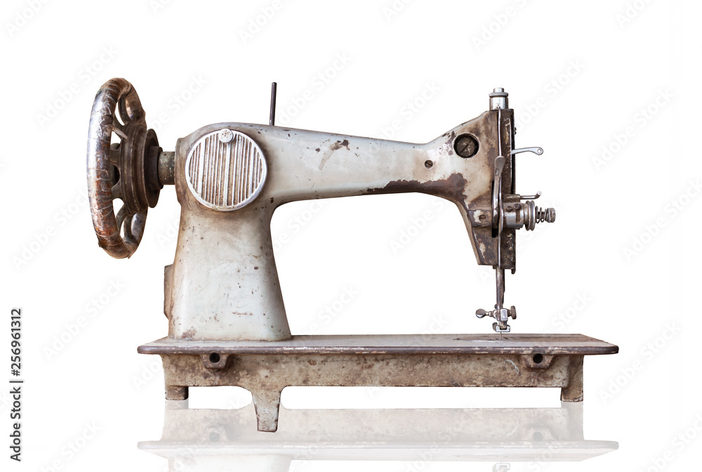 old sewing machine isolated on white background with clipping path ...