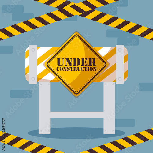 under construction label with barricade fence
