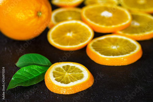 slices of orange close-up. background with oranges. © Nataliya