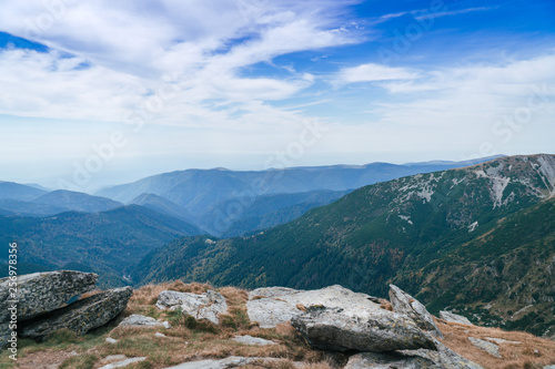 Panorama of Carpathians mountains and famous Transalpina road. Romania’s scenic drives Transalpina, climbing to the top of a mountain. One of the oldest road over the Carpathian Mountains © Sergey
