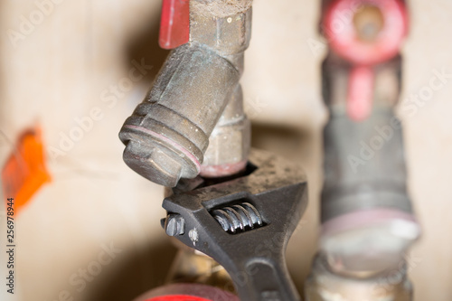 Plumbing, adjustable wrench