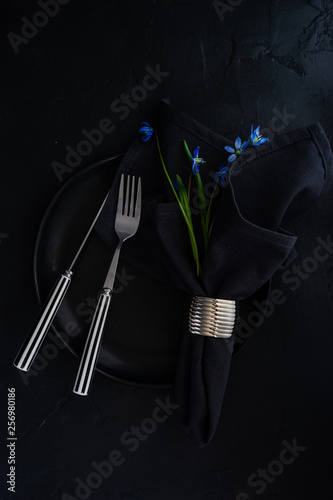 Spring table setting with blue scilla siberica