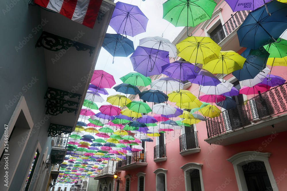 Colorful umbrellas hanging over street in Old San Juan, Puerto Rico