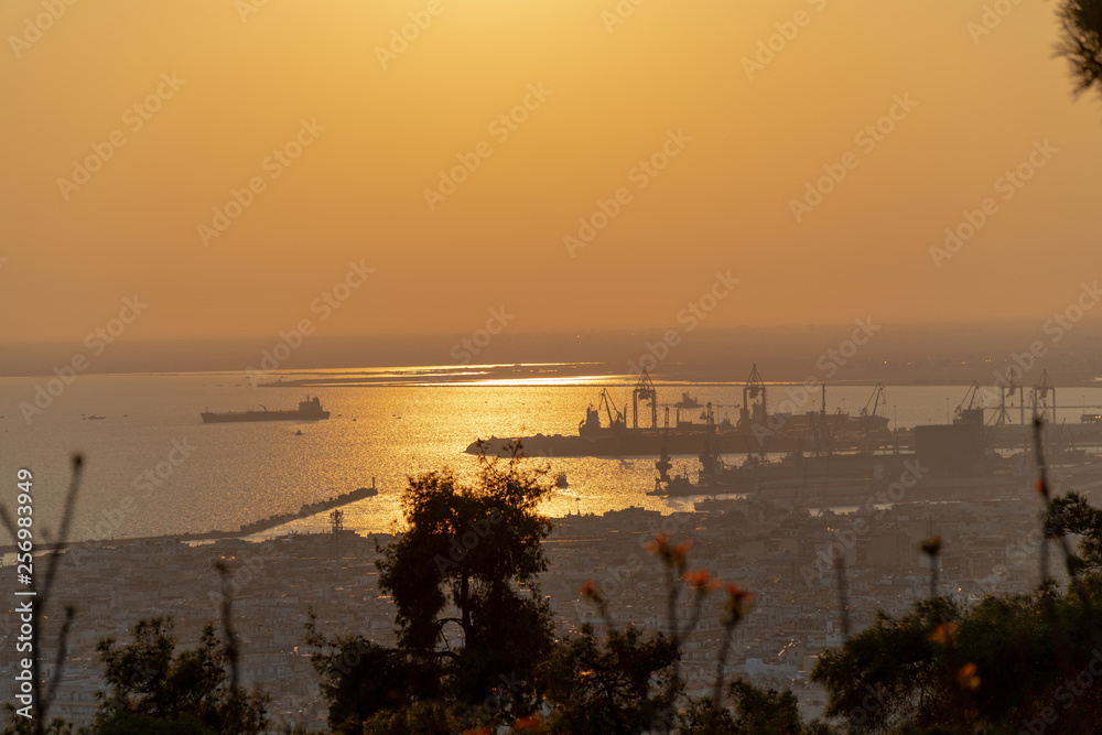 Thessaloniki / Greece 22 march 2019 : sunset in the most beautiful city of Greece photo taken from the hilltop forest Kedrinos Lofos, also known as Seich Sou,the temperture is fine for a walk