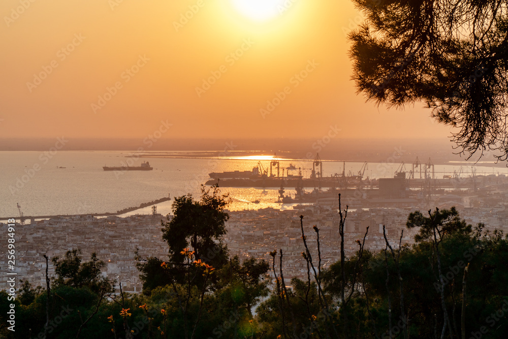 Thessaloniki / Greece 22 march 2019 : sunset in the most beautiful city of Greece photo taken from the hilltop forest Kedrinos Lofos, also known as Seich Sou,the temperture is fine for a walk
