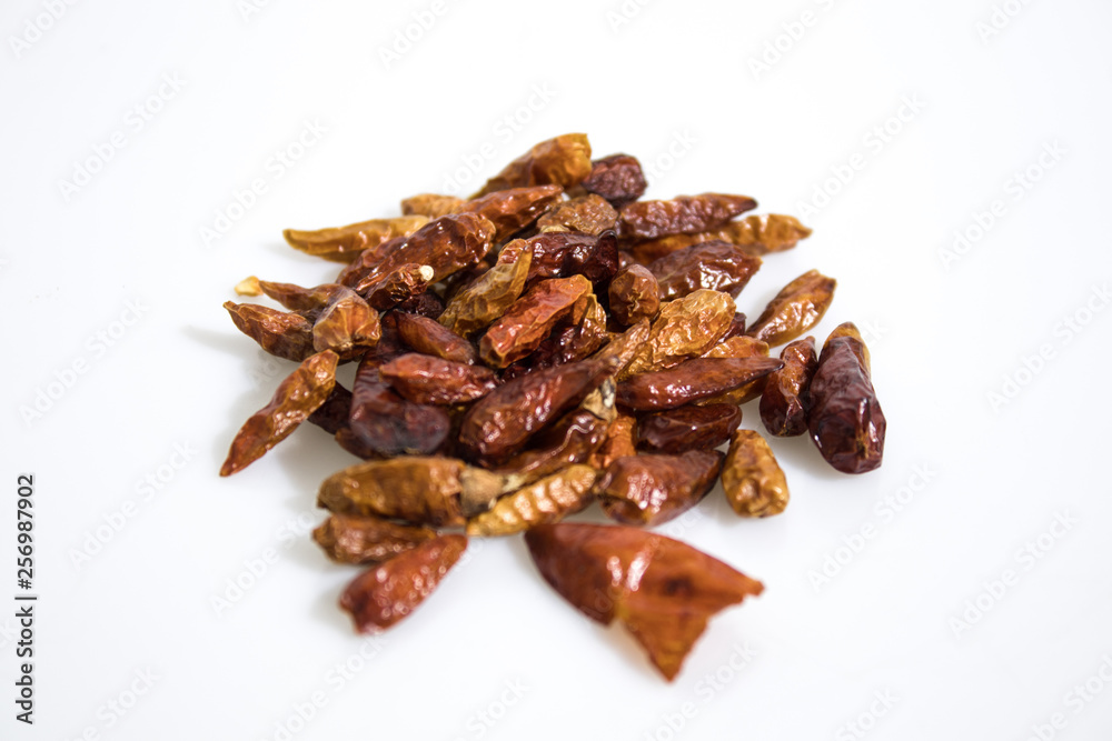 Red dried hot peppers isolated in a white background