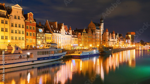 Night view of Gdansk harbor and Motlawa river, located in the Old Town of Gdansk city, Poland