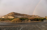 Beautiful rainbow above mosque in Ancient Kourion, Cyprus, after rain