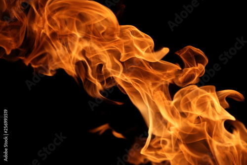 burning flame on dark background for abstract graphic design purpose © Akarawut