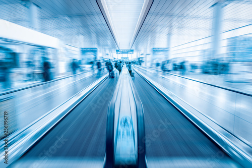 modern passenger conveyor motion blur