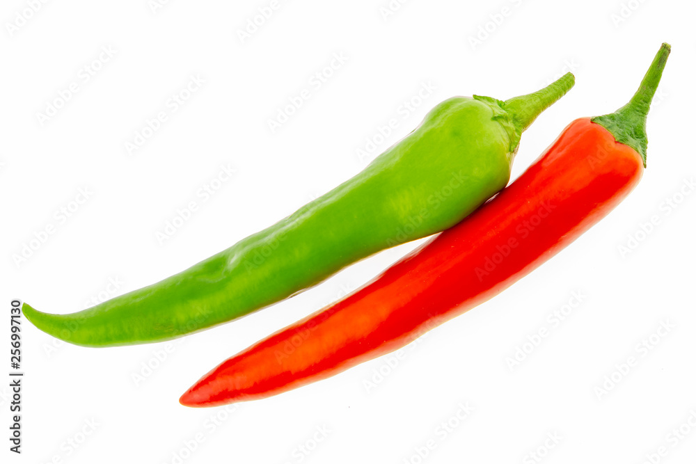pair of bright juicy hot peppers long peppers peppers red seasoning sauce on a white background