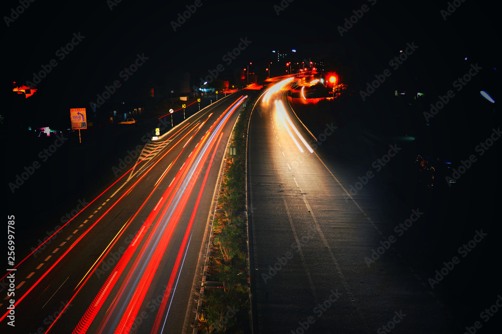 Long shutter photograph of traffic Long shutter photograph of traffic