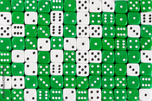 Background patteren of random ordered green and white dices